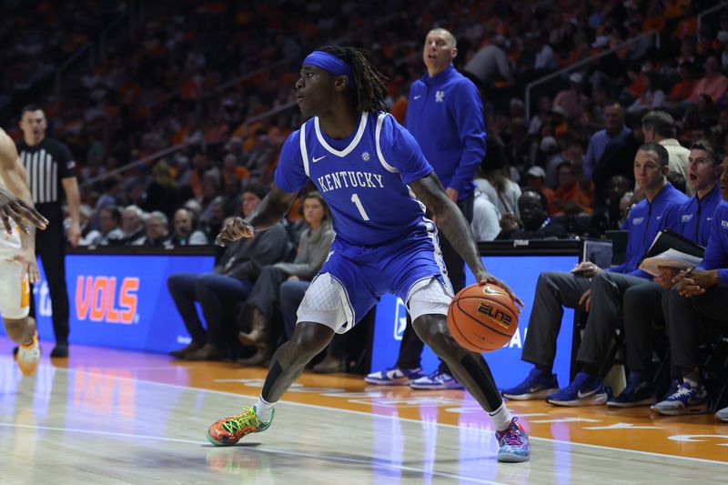 Jan 17, 2026; Knoxville, Tennessee, USA; Kentucky Wildcats guard Denzel Aberdeen (1) moves the ball against the Tennessee Volunteers during the second half at Thompson-Boling Arena at Food City Center. Mandatory Credit: Randy Sartin-Imagn Images
