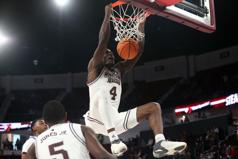 Dec 3, 2023; Starkville, Mississippi, USA; Mississippi State Bulldogs forward Cameron Matthews (4) dunks during the second half against the Southern Jaguars at Humphrey Coliseum. Mandatory Credit: Petre Thomas-USA TODAY Sports