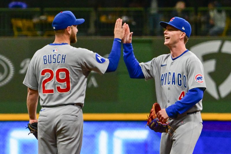 May 2, 2025; Milwaukee, Wisconsin, USA;  Chicago Cubs center fielder Pete Crow-Armstrong (4) celebrates with first baseman Michael Busch (29) after the Cubs beat the Milwaukee Brewers at American Family Field. Mandatory Credit: Benny Sieu-Imagn Images