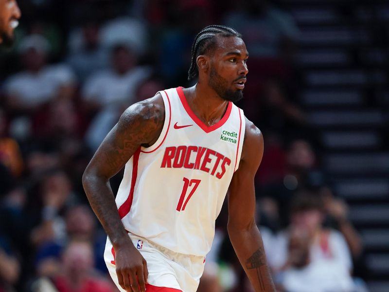 HOUSTON, TEXAS - OCTOBER 10: Tari Eason #17 of the Houston Rockets dribbles the ball during the preseason game against the Indiana Pacers at Toyota Center on October 10, 2023 in Houston, Texas. NOTE TO USER: User expressly acknowledges and agrees that, by downloading and or using this photograph, User is consenting to the terms and conditions of the Getty Images License Agreement. (Photo by Alex Bierens de Haan/Getty Images)