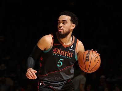 WASHINGTON, DC -? DECEMBER 26:  Tyus Jones #5 of the Washington Wizards goes to the basket during the game on December 26, 2023 at Capital One Arena in Washington, DC. NOTE TO USER: User expressly acknowledges and agrees that, by downloading and or using this Photograph, user is consenting to the terms and conditions of the Getty Images License Agreement. Mandatory Copyright Notice: Copyright 2023 NBAE (Photo by Stephen Gosling/NBAE via Getty Images)