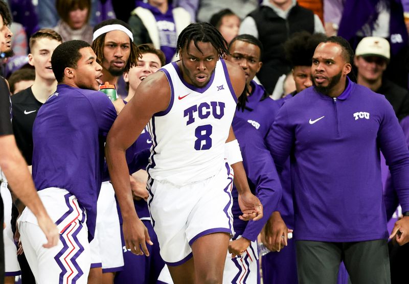 Jan 13, 2024; Fort Worth, Texas, USA;  TCU Horned Frogs center Ernest Udeh Jr. (8) reacts during the second half against the Houston Cougars at Ed and Rae Schollmaier Arena. Mandatory Credit: Kevin Jairaj-USA TODAY Sports