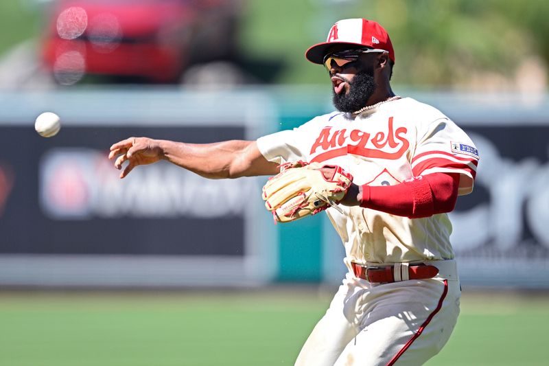 Aug 23, 2023; Anaheim, California, USA; Los Angeles Angels second baseman Luis Rengifo (2) throws to first base on a ground out by Cincinnati Reds catcher Luke Maile (not pictured) during the seventh inning at Angel Stadium. Mandatory Credit: Orlando Ramirez-USA TODAY Sports