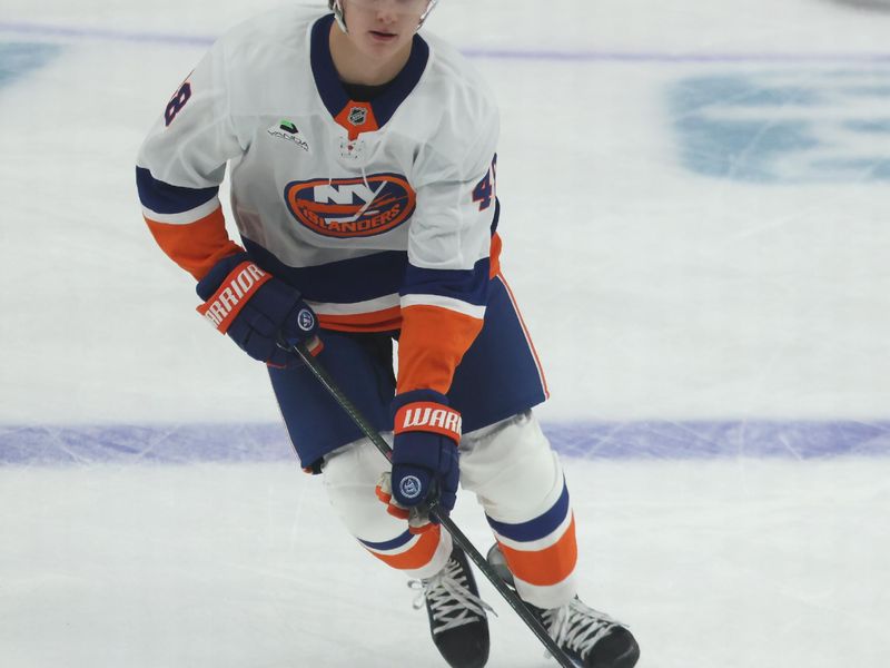 Oct 9, 2025; Pittsburgh, Pennsylvania, USA;  New York Islanders defenseman Matthew Schaefer (48) warms up  before making his NHL debut against the Pittsburgh Penguins at PPG Paints Arena. Mandatory Credit: Charles LeClaire-Imagn Images