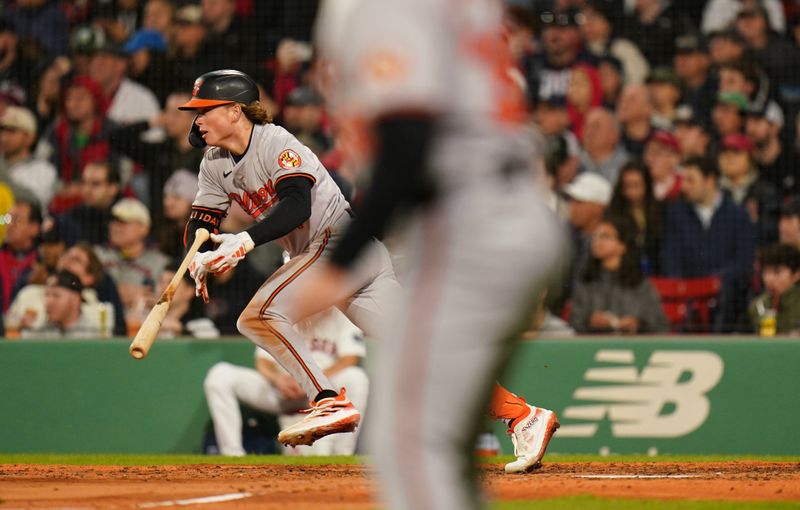 Apr 10, 2024; Boston, Massachusetts, USA; Baltimore Orioles second base Jackson Holliday (7) grounds out at first base but drives in a run against the Boston Red Sox in the sixth inning at Fenway Park. Mandatory Credit: David Butler II-USA TODAY Sports