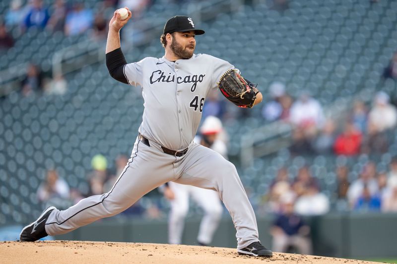 Apr 23, 2025; Minneapolis, Minnesota, USA; Chicago White Sox starting pitcher Bryse Wilson (46) pitches to Minnesota Twins center fielder Byron Buxton (25) in the first inning at Target Field. Mandatory Credit: Matt Blewett-Imagn Images