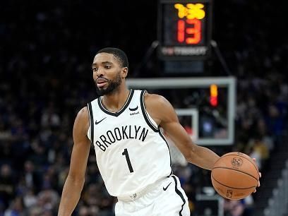 SAN FRANCISCO, CALIFORNIA - DECEMBER 16: Mikal Bridges #1 of the Brooklyn Nets dribbles the ball up court against the Golden State Warriors during the fourth quarter of an NBA basketball game at Chase Center on December 16, 2023 in San Francisco, California. NOTE TO USER: User expressly acknowledges and agrees that, by downloading and or using this photograph, User is consenting to the terms and conditions of the Getty Images License Agreement. (Photo by Thearon W. Henderson/Getty Images)