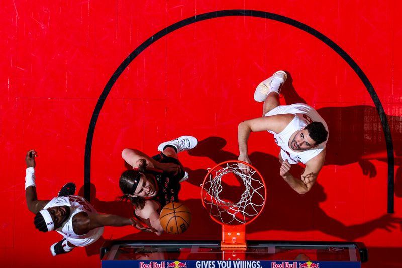 TORONTO, CANADA - FEBRUARY 10: Kelly Olynyk #41 of the Toronto Raptors drives to the basket during the game against the Cleveland Cavaliers on February 10, 2024 at the Scotiabank Arena in Toronto, Ontario, Canada.  NOTE TO USER: User expressly acknowledges and agrees that, by downloading and or using this Photograph, user is consenting to the terms and conditions of the Getty Images License Agreement.  Mandatory Copyright Notice: Copyright 2024 NBAE (Photo by Vaughn Ridley/NBAE via Getty Images)