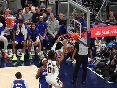 INDIANAPOLIS, IN - DECEMBER 18: Bennedict Mathurin #00 of the Indiana Pacers dunks the ball during the game against the LA Clippers on December 18, 2023 at Gainbridge Fieldhouse in Indianapolis, Indiana. NOTE TO USER: User expressly acknowledges and agrees that, by downloading and or using this Photograph, user is consenting to the terms and conditions of the Getty Images License Agreement. Mandatory Copyright Notice: Copyright 2023 NBAE (Photo by Pepper Robinson/NBAE via Getty Images)