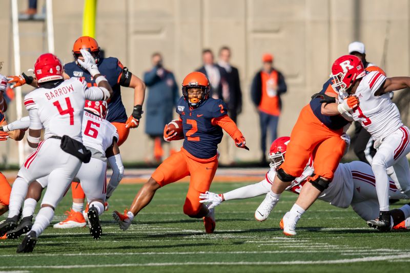 Nov 2, 2019; Champaign, IL, USA; Illinois Fighting Illini running back Reggie Corbin (2) runs the ball against the Rutgers Scarlet Knights during the first half at Memorial Stadium. Mandatory Credit: Patrick Gorski-USA TODAY Sports