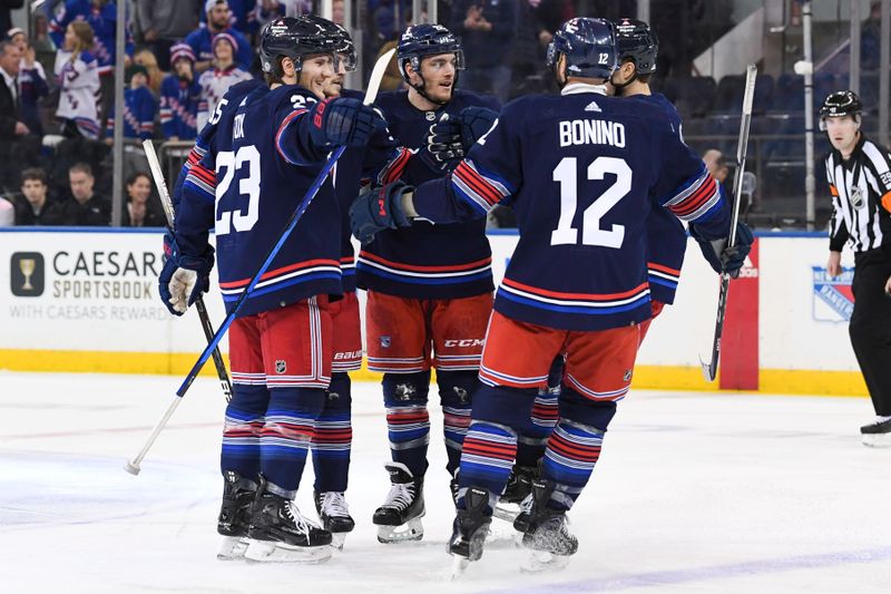 Dec 23, 2023; New York, New York, USA; New York Rangers celebrates the goal by New York Rangers defenseman Ryan Lindgren (55) against the Buffalo Sabres during the first period at Madison Square Garden. Mandatory Credit: Dennis Schneidler-USA TODAY Sports