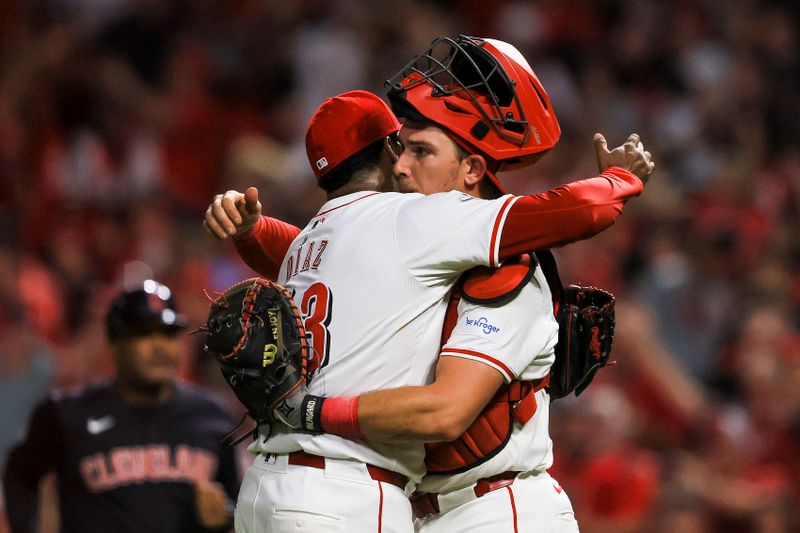 Jun 12, 2024; Cincinnati, Ohio, USA; Cincinnati Reds relief pitcher Alexis Diaz (43) hugs catcher Tyler Stephenson (37) after the victory over the Cleveland Guardians at Great American Ball Park. Mandatory Credit: Katie Stratman-USA TODAY Sports