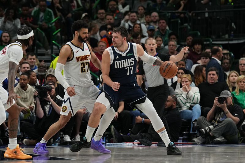 DALLAS, TX - MARCH 17: Luka Doncic #77 of the Dallas Mavericks handles the ball during the game against the Denver Nuggets on March 17, 2024 at the American Airlines Center in Dallas, Texas. NOTE TO USER: User expressly acknowledges and agrees that, by downloading and or using this photograph, User is consenting to the terms and conditions of the Getty Images License Agreement. Mandatory Copyright Notice: Copyright 2024 NBAE (Photo by Glenn James/NBAE via Getty Images)