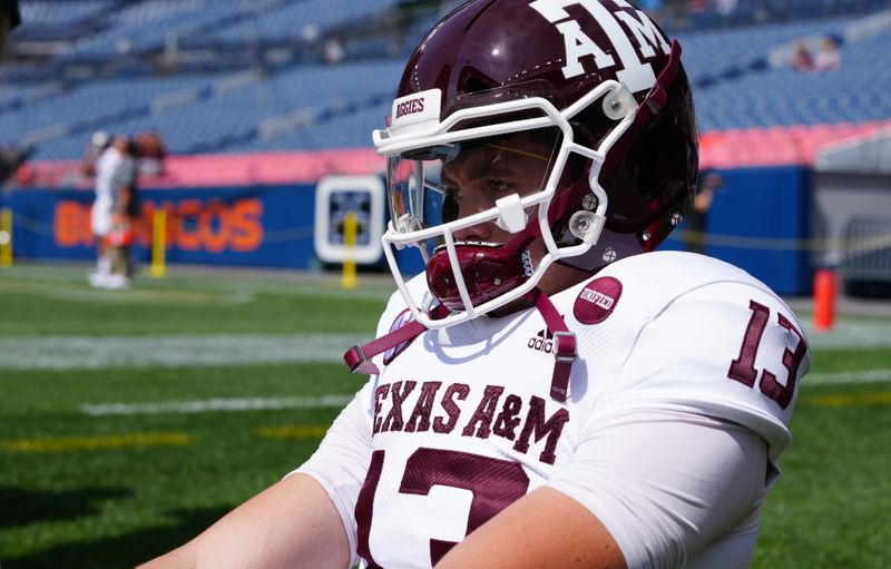 Sep 11, 2021; Denver, Colorado, USA; Texas A&M Aggies quarterback Haynes King (13) before the game against the Colorado Buffaloes  at Empower Field at Mile High. Mandatory Credit: Ron Chenoy-USA TODAY Sports