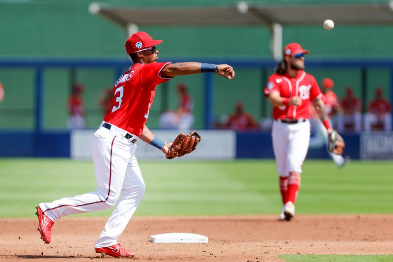 Mar 2, 2023; West Palm Beach, Florida, USA; Washington Nationals shortstop Jeter Downs (3) throws to first base to take out Miami Marlins shortstop Joey Wendle (not pictured) during the second inning at The Ballpark of the Palm Beaches. Mandatory Credit: Sam Navarro-USA TODAY Sports