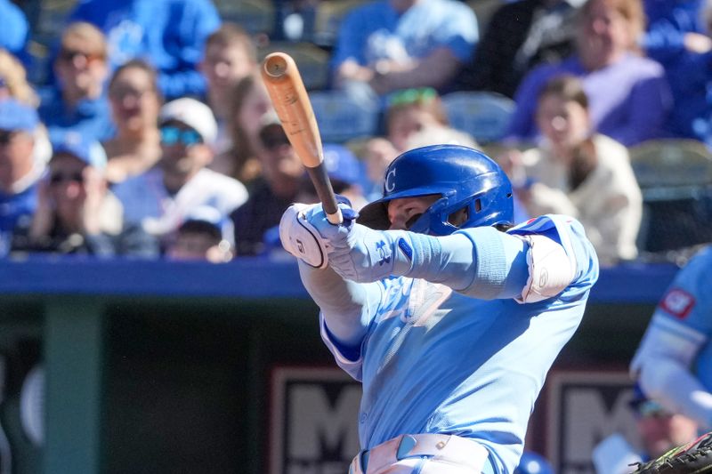 Apr 11, 2024; Kansas City, Missouri, USA; Kansas City Royals shortstop Bobby Witt Jr. (7) hits a three run home run in the seventh inning against the Houston Astros at Kauffman Stadium. Mandatory Credit: Denny Medley-USA TODAY Sports