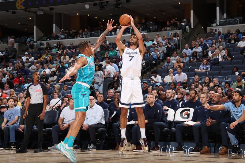 MEMPHIS, TN - OCTOBER 10: Santi Aldama #7 of the Memphis Grizzlies shoots a three point basket during the game against the Charlotte Hornets during a NBA Preseason game on October 10, 2024 at FedExForum in Memphis, Tennessee. NOTE TO USER: User expressly acknowledges and agrees that, by downloading and or using this photograph, User is consenting to the terms and conditions of the Getty Images License Agreement. Mandatory Copyright Notice: Copyright 2024 NBAE (Photo by Joe Murphy/NBAE via Getty Images)