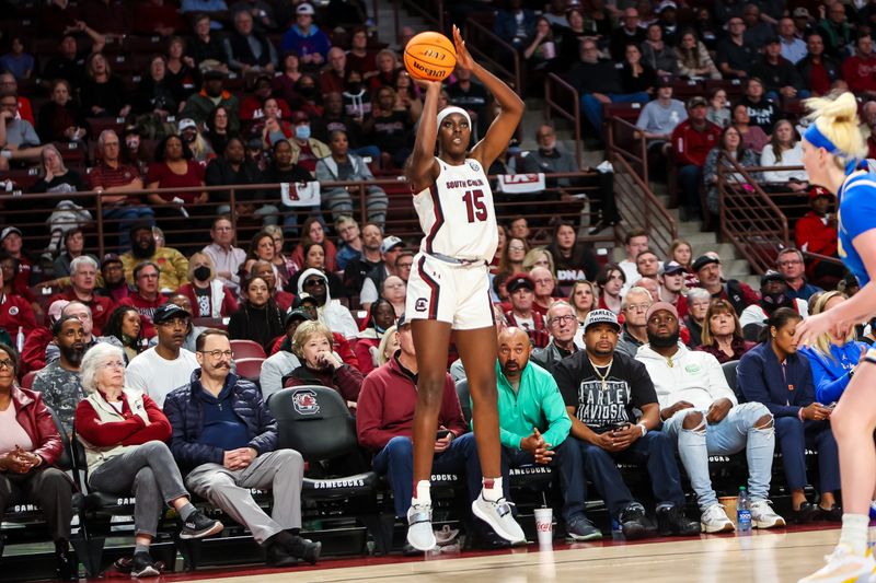 Nov 29, 2022; Columbia, South Carolina, USA; South Carolina Gamecocks forward Laeticia Amihere (15) shoots against the UCLA Bruins in the first half at Colonial Life Arena. Mandatory Credit: Jeff Blake-USA TODAY Sports