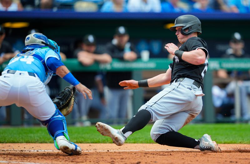 May 8, 2025; Kansas City, Missouri, USA; Chicago White Sox first baseman Andrew Vaughn (25) is tagged out at home by Kansas City Royals catcher Freddy Fermin (34) during the fifth inning at Kauffman Stadium. Mandatory Credit: Jay Biggerstaff-Imagn Images