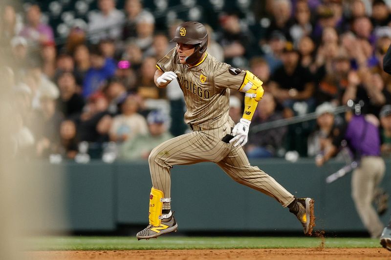 Apr 24, 2024; Denver, Colorado, USA; San Diego Padres shortstop Ha-Seong Kim (7) runs to second on a single after an error by the Colorado Rockies in the sixth inning at Coors Field. Mandatory Credit: Isaiah J. Downing-USA TODAY Sports