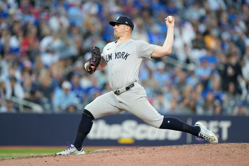 Jun 27, 2024; Toronto, Ontario, CAN; New York Yankees starting pitcher Carlos Rodon (55) pitches to the Toronto Blue Jays during the fifth inning at Rogers Centre. Mandatory Credit: John E. Sokolowski-USA TODAY Sports