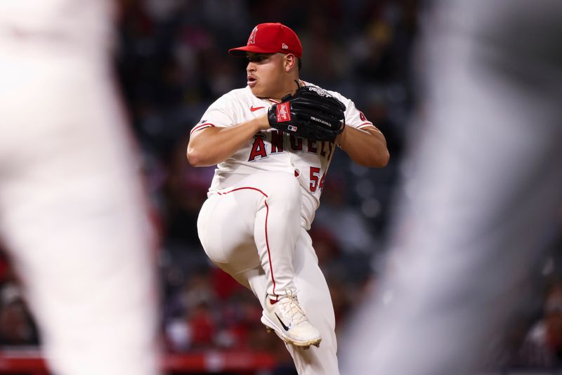 May 24, 2024; Anaheim, California, USA; Los Angeles Angels pitcher José Suarez (54) pitches during the fifth inning of a game against the Cleveland Guardians at Angel Stadium. Mandatory Credit: Jessica Alcheh-USA TODAY Sports