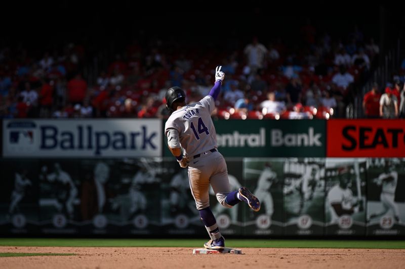 Jun 8, 2024; St. Louis, Missouri, USA; Colorado Rockies’ Ezequiel Tovar (14) gestures after hitting a two-run home run against the St. Louis Cardinals during the seventh inning at Busch Stadium. Mandatory Credit: Jeff Le-USA TODAY Sports