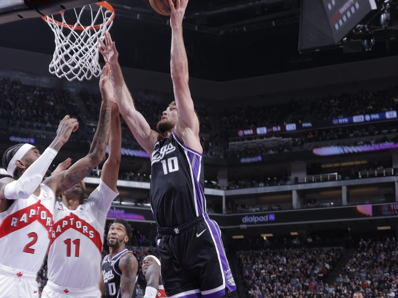 SACRAMENTO, CA - JANUARY 5: Domantas Sabonis #10 of the Sacramento Kings shoots the ball during the game against the Toronto Raptors on January 5, 2024 at Golden 1 Center in Sacramento, California. NOTE TO USER: User expressly acknowledges and agrees that, by downloading and or using this Photograph, user is consenting to the terms and conditions of the Getty Images License Agreement. Mandatory Copyright Notice: Copyright 2024 NBAE (Photo by Rocky Widner/NBAE via Getty Images)