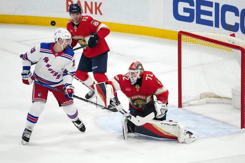 Dec 29, 2023; Sunrise, Florida, USA; Florida Panthers goaltender Sergei Bobrovsky (72) deflects the shot of New York Rangers left wing Chris Kreider (20) during the first period at Amerant Bank Arena. Mandatory Credit: Jasen Vinlove-USA TODAY Sports