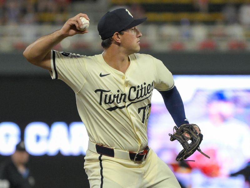 Jul 3, 2024; Minneapolis, Minnesota, USA; Minnesota Twins infielder Brooks Lee (72) throws to first for a force out against the Detroit Tigers during the ninth inning at Target Field. Mandatory Credit: Nick Wosika-USA TODAY Sports