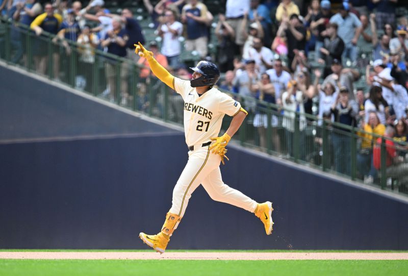 May 1, 2024; Milwaukee, Wisconsin, USA; Milwaukee Brewers shortstop Willy Adames (27) rounds the bases after hitting a home run against the Tampa Bay Rays in the sixth inning at American Family Field. Mandatory Credit: Michael McLoone-USA TODAY Sports