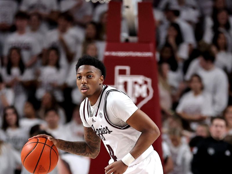 Jan 18, 2023; College Station, Texas, USA; Texas A&M Aggies guard Wade Taylor IV (4) handles the ball against the Florida Gators during the second half at Reed Arena. Mandatory Credit: Erik Williams-USA TODAY Sports
