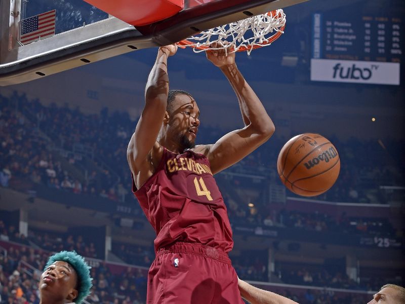 CLEVELAND, OH - NOVEMBER 18: Evan Mobley #4 of the Cleveland Cavaliers dunks the ball during the game against the Charlotte Hornets on November 18, 2022 at Rocket Mortgage FieldHouse in Cleveland, Ohio. NOTE TO USER: User expressly acknowledges and agrees that, by downloading and/or using this Photograph, user is consenting to the terms and conditions of the Getty Images License Agreement. Mandatory Copyright Notice: Copyright 2022 NBAE (Photo by David Liam Kyle/NBAE via Getty Images)