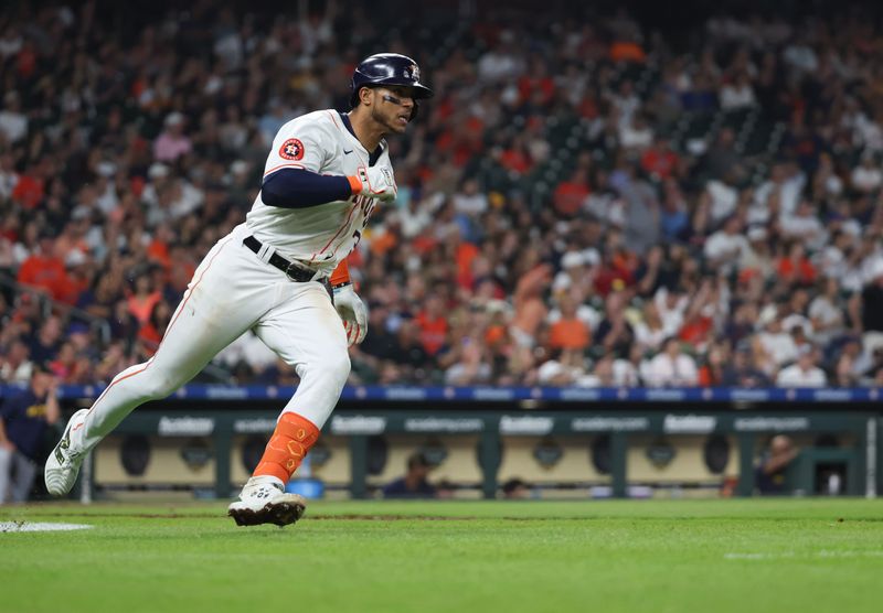 May 18, 2024; Houston, Texas, USA; Houston Astros shortstop Jeremy Pena (3) hits a stand up double against the Milwaukee Brewers in the sixth inning at Minute Maid Park. Mandatory Credit: Thomas Shea-USA TODAY Sports