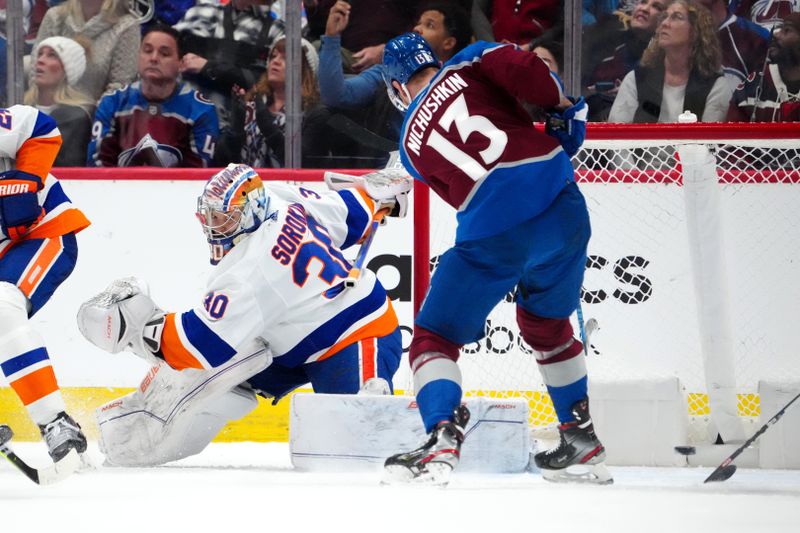 Jan 2, 2024; Denver, Colorado, USA; Colorado Avalanche right wing Valeri Nichushkin (13) scores on New York Islanders goaltender Ilya Sorokin (30) in the third period at Ball Arena. Mandatory Credit: Ron Chenoy-USA TODAY Sports