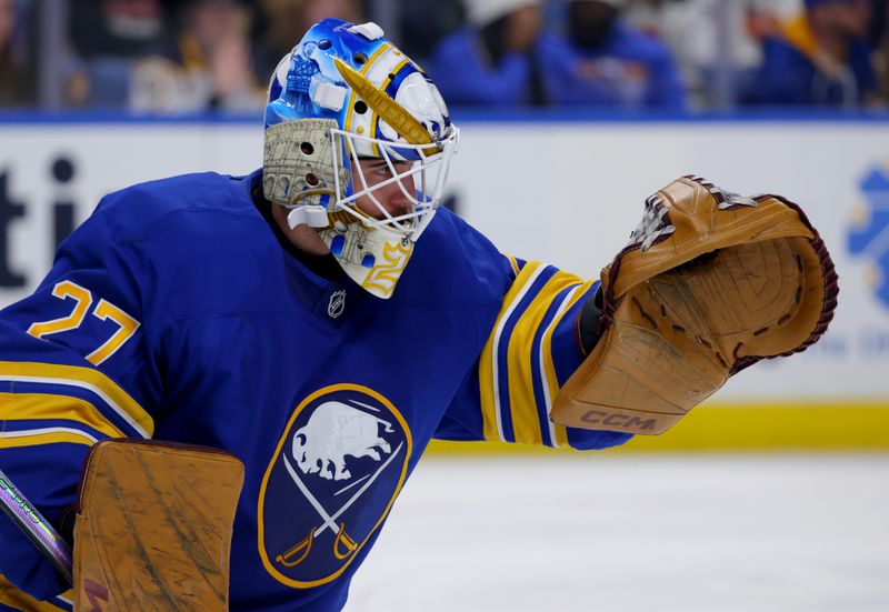 Oct 12, 2024; Buffalo, New York, USA;  Buffalo Sabres goaltender Devon Levi (27) during the third period against the Florida Panthers at KeyBank Center. Mandatory Credit: Timothy T. Ludwig-Imagn Images