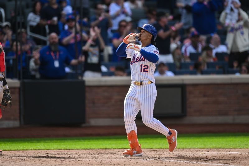 Sep 21, 2025; New York City, New York, USA; New York Mets shortstop Francisco Lindor (12) reacts after hitting a solo home run against the Washington Nationals during the sixth inning at Citi Field. Mandatory Credit: John Jones-Imagn Images