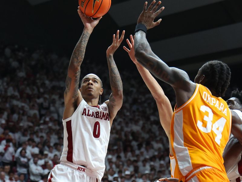 Jan 24, 2026; Tuscaloosa, Alabama, USA; Alabama Crimson Tide guard Labaron Philon (0) shoots over Tennessee Volunteers forward Felix Okpara (34) during the second half at Coleman Coliseum. Mandatory Credit: David Leong-Imagn Images