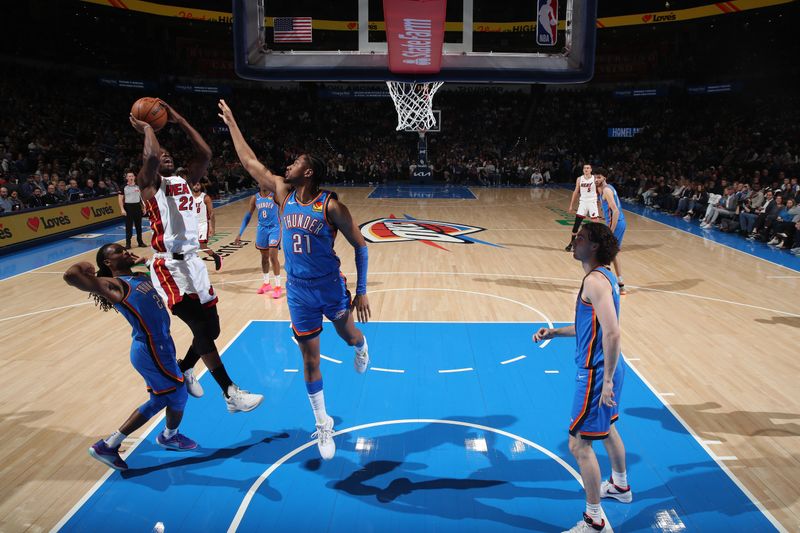 OKLAHOMA CITY, OK - MARCH 8:  Jimmy Butler #22 of the Miami Heat drives to the basket during the game against the Oklahoma City Thunder on March 8, 2024 at Paycom Arena in Oklahoma City, Oklahoma. NOTE TO USER: User expressly acknowledges and agrees that, by downloading and or using this photograph, User is consenting to the terms and conditions of the Getty Images License Agreement. Mandatory Copyright Notice: Copyright 2024 NBAE (Photo by Zach Beeker/NBAE via Getty Images)