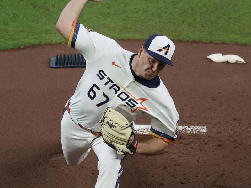 May 12, 2025; Houston, Texas, USA; Houston Astros relief pitcher Ryan Gusto (67) pitches against the Kansas City Royals in the first inning at Daikin Park. Mandatory Credit: Thomas Shea-Imagn Images