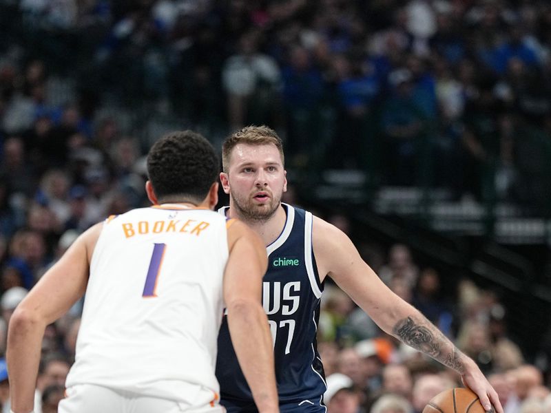 DALLAS, TX - NOVEMBER 8: Luka Doncic #77 of the Dallas Mavericks looks to pass the ball during the game against the Phoenix Suns on November 6, 2024 at the American Airlines Center in Dallas, Texas. NOTE TO USER: User expressly acknowledges and agrees that, by downloading and or using this photograph, User is consenting to the terms and conditions of the Getty Images License Agreement. Mandatory Copyright Notice: Copyright 2024 NBAE (Photo by Glenn James/NBAE via Getty Images)