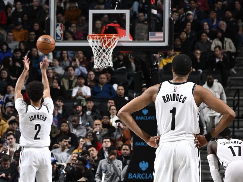 BROOKLYN, NY - MARCH 5: Mikal Bridges #1 of the Brooklyn Nets looks on during the game against the Philadelphia 76ers on March 5, 2024 at Barclays Center in Brooklyn, New York. NOTE TO USER: User expressly acknowledges and agrees that, by downloading and or using this Photograph, user is consenting to the terms and conditions of the Getty Images License Agreement. Mandatory Copyright Notice: Copyright 2024 NBAE (Photo by David Dow/NBAE via Getty Images)