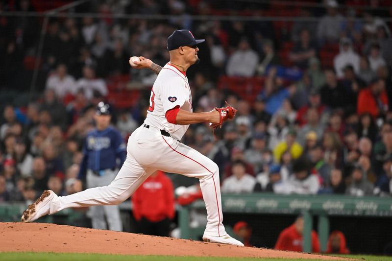 May 16, 2024; Boston, Massachusetts, USA;  Boston Red Sox pitcher Brennan Bernardino (83) pitches against the Tampa Bay Rays  during the fourth inning at Fenway Park. Mandatory Credit: Eric Canha-USA TODAY Sports