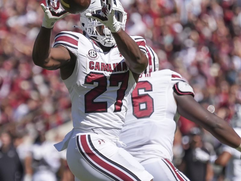 Oct 12, 2024; Tuscaloosa, Alabama, USA;  South Carolina Gamecocks running back Oscar Adaway III (27) catches a screen pass against Alabama at Bryant-Denny Stadium. Mandatory Credit: Gary Cosby Jr.-Imagn Images