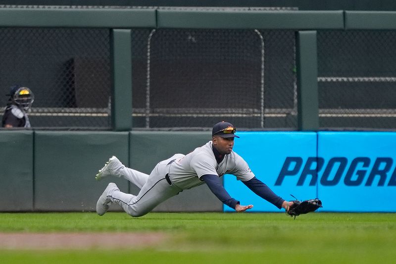 Apr 13, 2025; Minneapolis, Minnesota, USA; Detroit Tigers left fielder Justyn-Henry Malloy (44) catches a ball hit by Minnesota Twins center fielder Byron Buxton (not pictured) in the eighth inning at Target Field. Mandatory Credit: Bruce Kluckhohn-Imagn Images