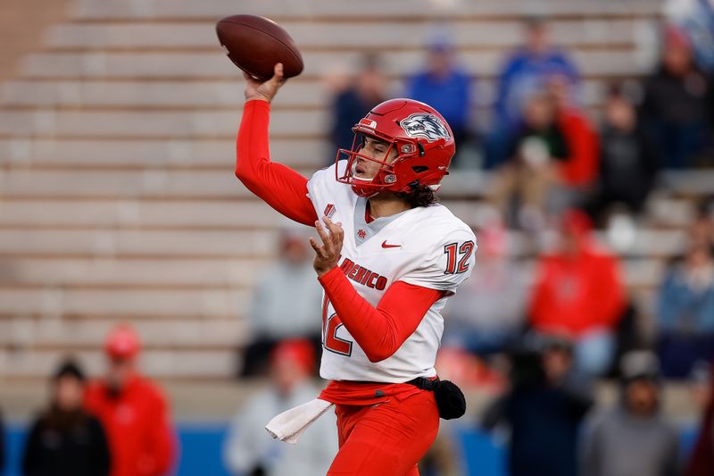 Nov 12, 2022; Colorado Springs, Colorado, USA; New Mexico Lobos quarterback Justin Holaday (12) attempts a pass in the fourth quarter against the Air Force Falcons at Falcon Stadium. Mandatory Credit: Isaiah J. Downing-USA TODAY Sports