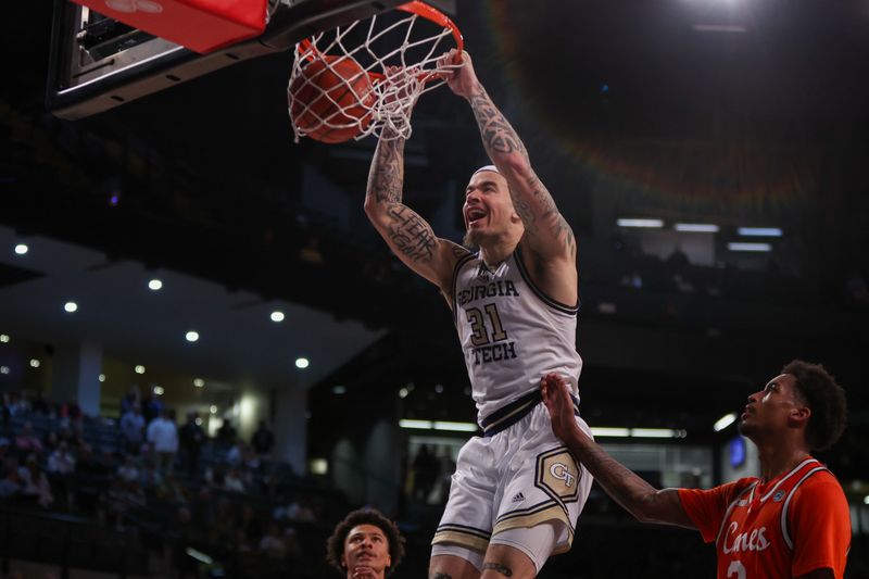 Mar 4, 2025; Atlanta, Georgia, USA; Georgia Tech Yellow Jackets forward Duncan Powell (31) dunks against the Miami Hurricanes in the second half at McCamish Pavilion. Mandatory Credit: Brett Davis-Imagn Images