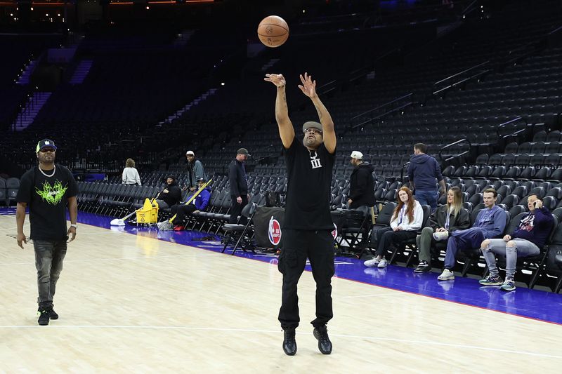 PHILADELPHIA, PENNSYLVANIA - MARCH 18: NBA Hall of Fame member and former Philadelphia 76er Allen Iverson shoots before a game between the Philadelphia 76ers and the Miami Heat at the Wells Fargo Center on March 18, 2024 in Philadelphia, Pennsylvania. NOTE TO USER: User expressly acknowledges and agrees that, by downloading and or using this photograph, User is consenting to the terms and conditions of the Getty Images License Agreement.  (Photo by Tim Nwachukwu/Getty Images)