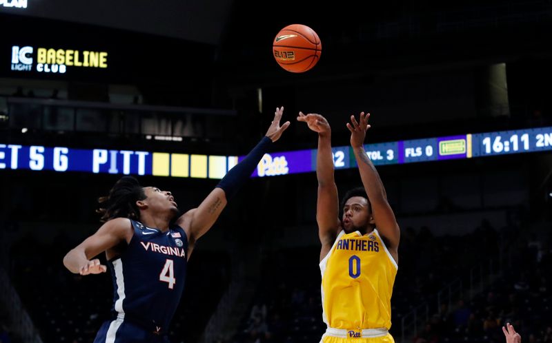 Jan 3, 2023; Pittsburgh, Pennsylvania, USA; Pittsburgh Panthers guard Nelly Cummings (0) shoots a three-point basket against Virginia Cavaliers guard Armaan Franklin (4) during the second half at the Petersen Events Center. Mandatory Credit: Charles LeClaire-USA TODAY Sports