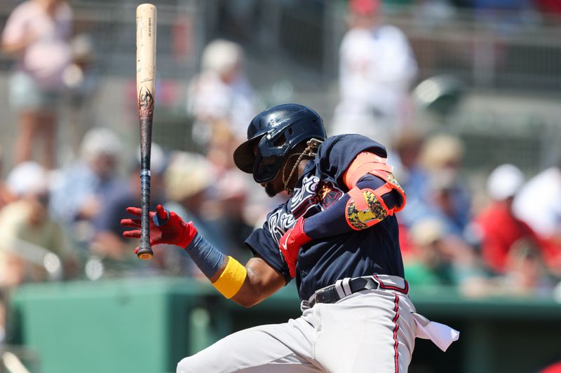 Mar 28, 2023; Fort Myers, Florida, USA;  Atlanta Braves right fielder Ronald Acuna Jr. (13) reacts to an inside pitch against the Boston Red Sox in the fourth inning during spring training at JetBlue Park at Fenway South. Mandatory Credit: Nathan Ray Seebeck-USA TODAY Sports